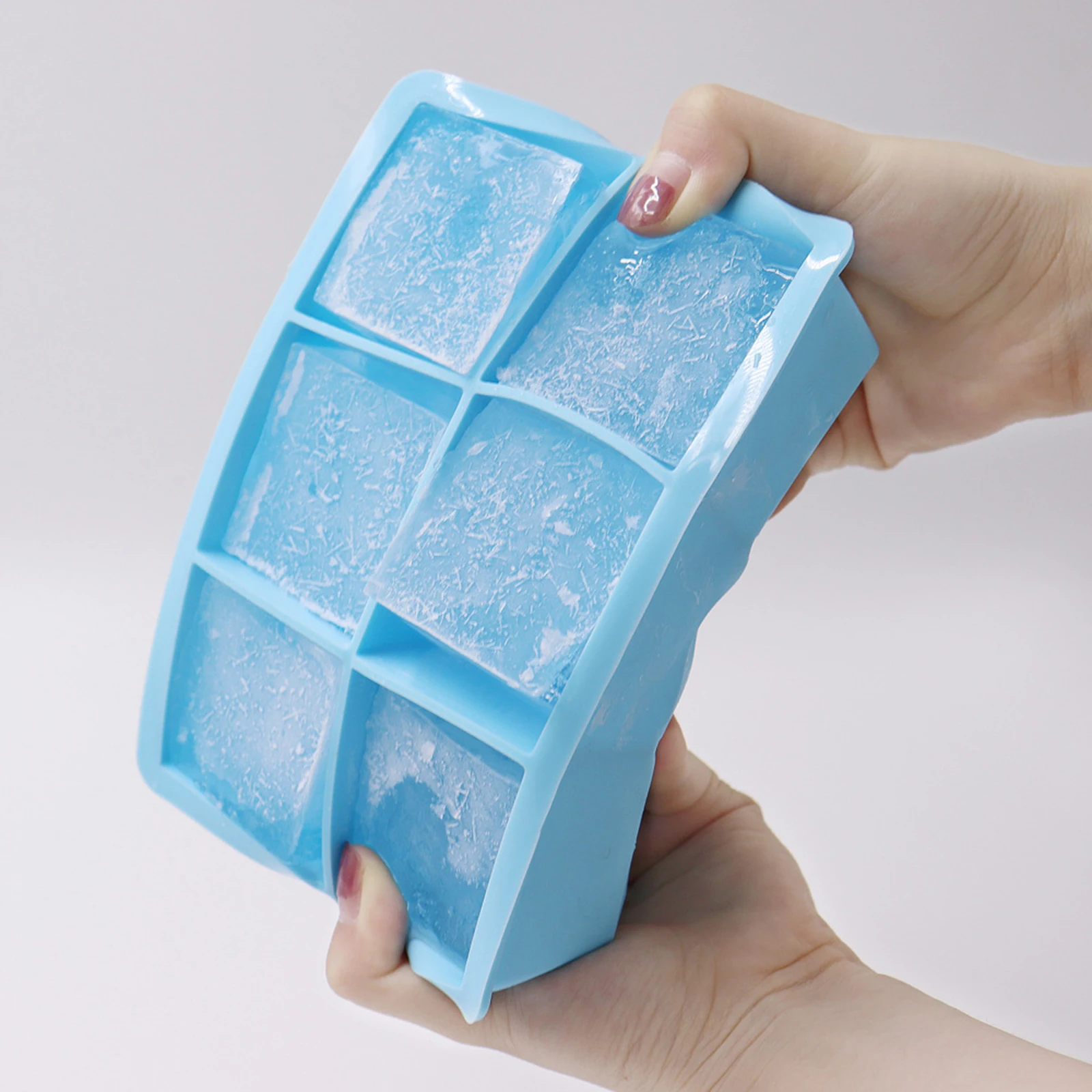 https://ae01.alicdn.com/kf/Hf61858b648474da0b47cf76aa569dcd5x/Reusable-BPA-Free-6-Grid-Ice-Cube-Trays-Silicone-Whiskey-Ice-Large-Square-Ice-Cube-Molds.jpg