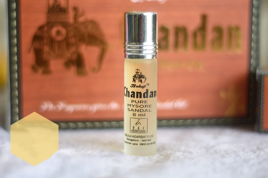 

Contains essential oils and fragrances, Strong sandalwood 8ml perfume sandalwood fragrance without alcohol