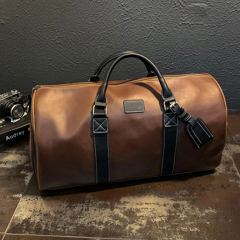 

Leisure trendy travel bag leather large capacity short travel single shoulder oblique satchel