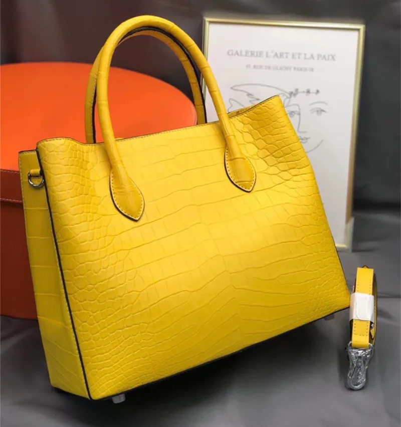 yellow croc purse
