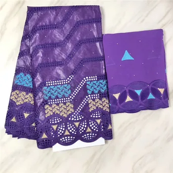 

Blue African Cotton Lace Fabric Cheap Sale Bazin Riche Lace Cutout Nigerian Laces Fabric For Wedding Dress Sew