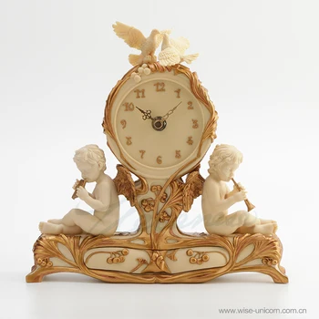 

Wei Ronnie furnishing articles clock two angels sitting blowing instrument ivory white painted golden birthday gift