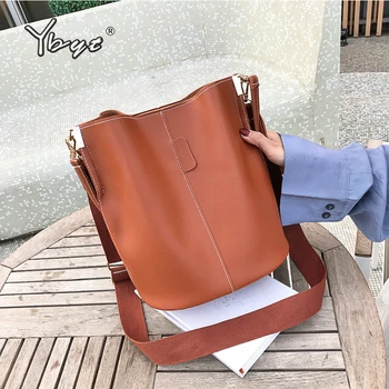 

YBYT fashion solid women bucket shoulder bag large capacity vintage PU Leather ladies handbags wide shoulder strap messenger bag
