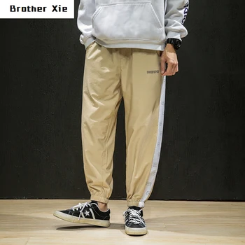 

Spring New Track Pants Men Fashion Contrast Color Casual Drawstring Trousers Man Streetwear Hip Hop Loose Joggers Sweatpants