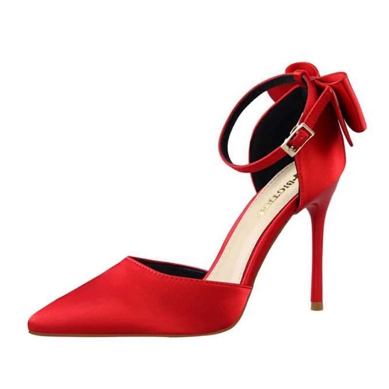 red heels with bow on back