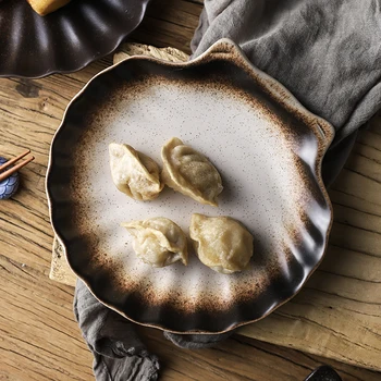 

Japanese stoneware plate black retro ceramic tableware dinner plate shell dish snack fruit snack breakfast plate Home kitchen