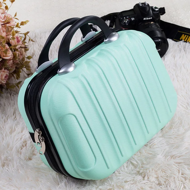 tiny suitcase on wheels