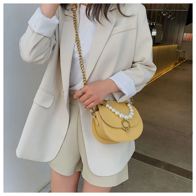 

Summer Pearl handheld bag woman 2019 new single shoulder slanted fashion chain saddle bag