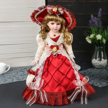 

Collectible ceramics doll "Rosalie in a beige and burgundy dress with a handbag and a hat" 40 cm 4520530