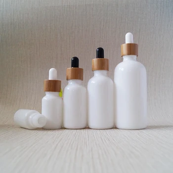 

Recycled CBD oil 10ml 15ml 20ml 30ml 50ml 100ml Essential oil luxury opal white porcelain glass dropper bottle with bamboo cap