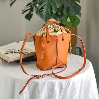 

Leather drawstring bucket bag calf leather shoulder bag vegetable tanned leather literary retro Messenger bag