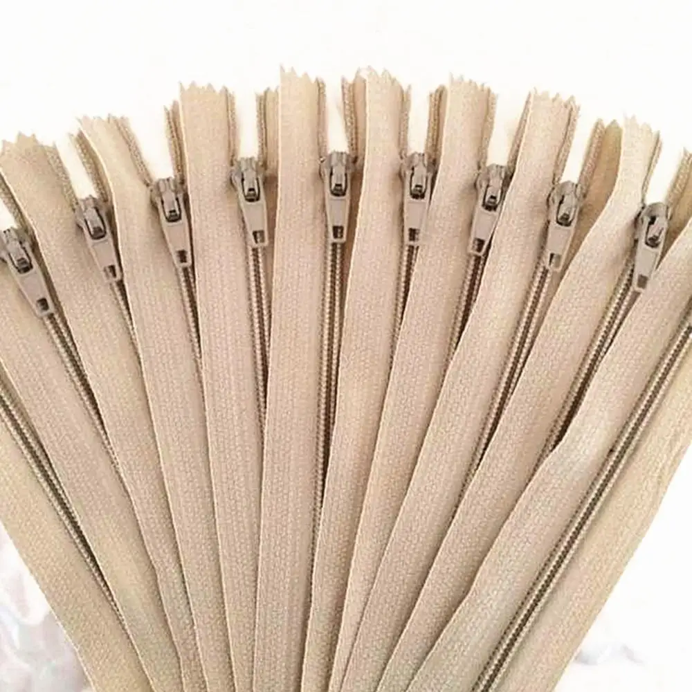 

10 pieces. Beige 50cm (20inch) nylon coil, zipper, tailor, crafter and fgdqrs