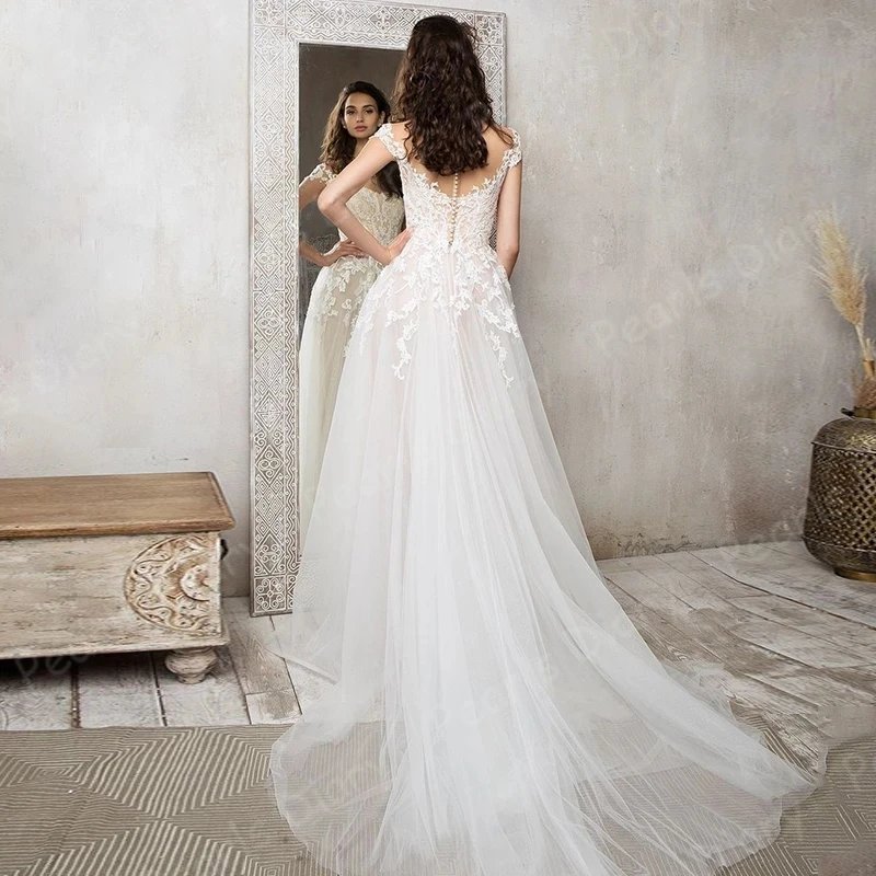 Charmming-A-line-Wedding-Gowns-2020-Sheer-O-neck-Cap-Sleeve-Sweep-Train-Lace-Applique-Bridal.jpg_Q90.jpg_.webp (1)