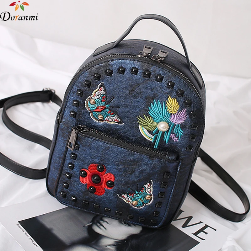

DORANMI Flower Embroidered Mini Backpacks For Women 2019 Rivet Leather Schoolbag Female Back Shoulder Bag Small Mochila DJB838