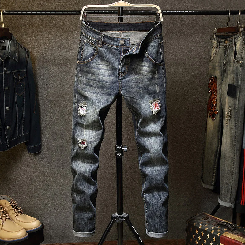 

Spring new Korean men's jeans slim straight tube hole embroidery patch youth casual elastic pants trend