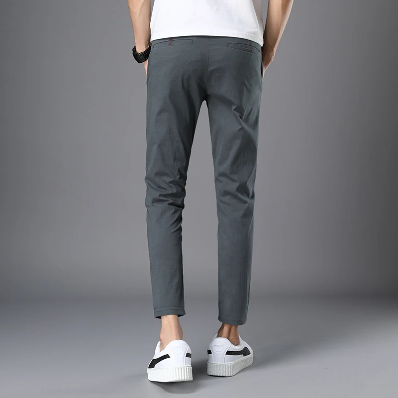 https://ae01.alicdn.com/kf/Hf7a136cd118944d6b72e66185ff5b1f7r/Spring-Summer-Thin-Men-Fashions-Solid-Color-Casual-Pants-Man-Slim-Fit-Elastic-Ankle-Length-High.jpg