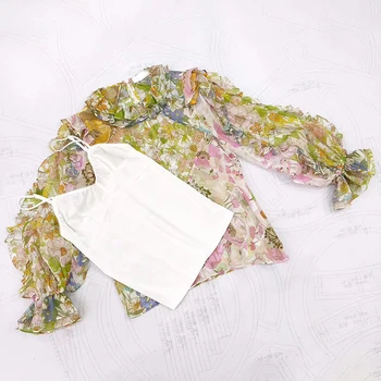 

2020 Early Huo Siyan Fairy Wind Real Silk Shivering Fungus Edge Design Feel Long Sleeve Round Neck Shirt Woman