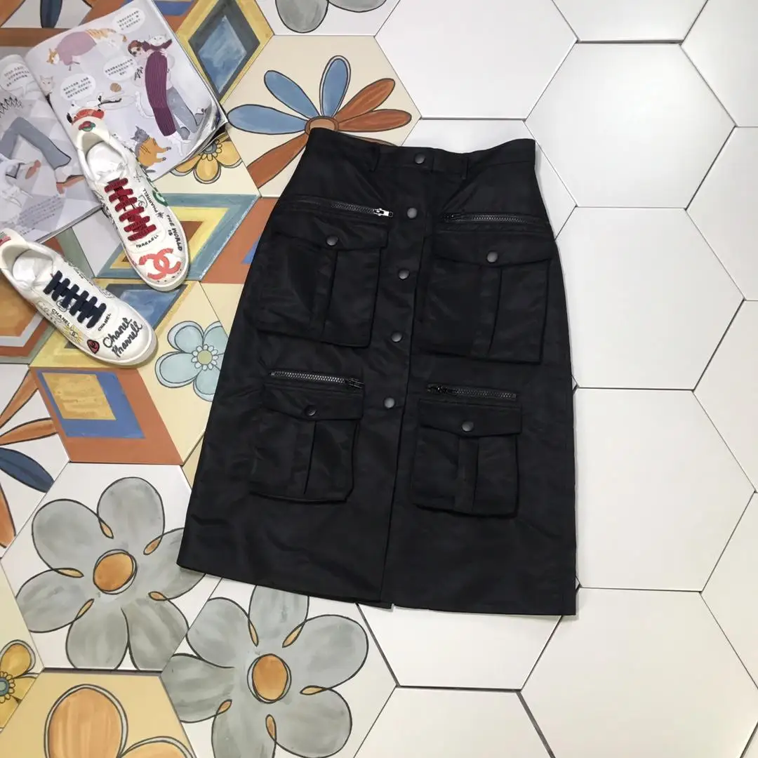 

2019 autumn and winter ladies new tooling style four pockets decorated one-piece high waist skirt 906