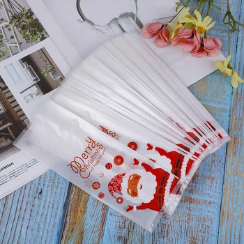 

50pcs Santa Christmas Gift Bags Plastic Packing Bake Cookies Biscuit Candy Bag Presents for Xmas Party Decoration 2019