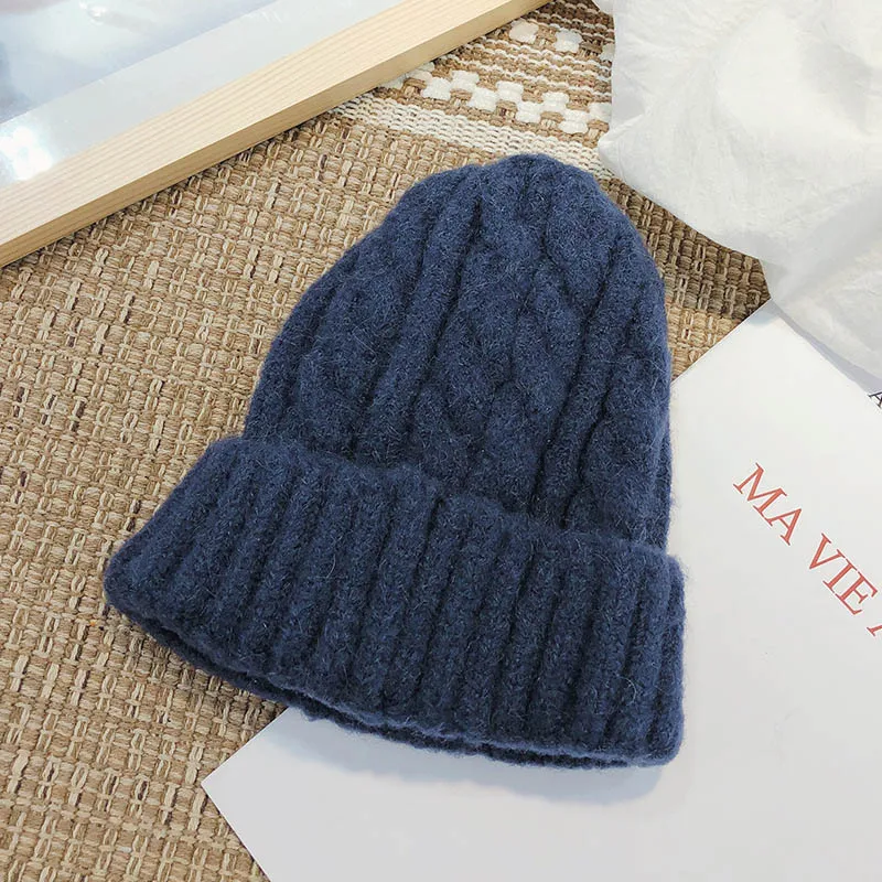 New trend hat wool hat Korean version of the wild outdoor thick warm knitted hat pure color twist hat