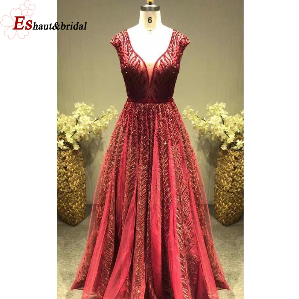 

Luxury Dubai Design V-Neck Evening Dresses Long 2019 Sequined Crystal Sleeveless Arabic A-Line Formal Party Gowns