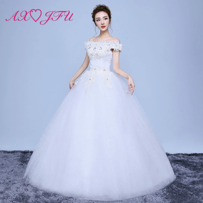 white wedding dress with red roses