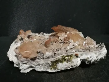 

183.4gMineral samples of natural pink calcite and pyrite Association