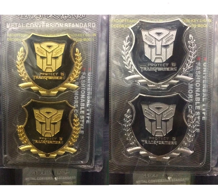 車の金属製のエンブレムバッジ3d保護破壊トランスフォーマーオートボットデスティック金 銀 Emblems Aliexpress