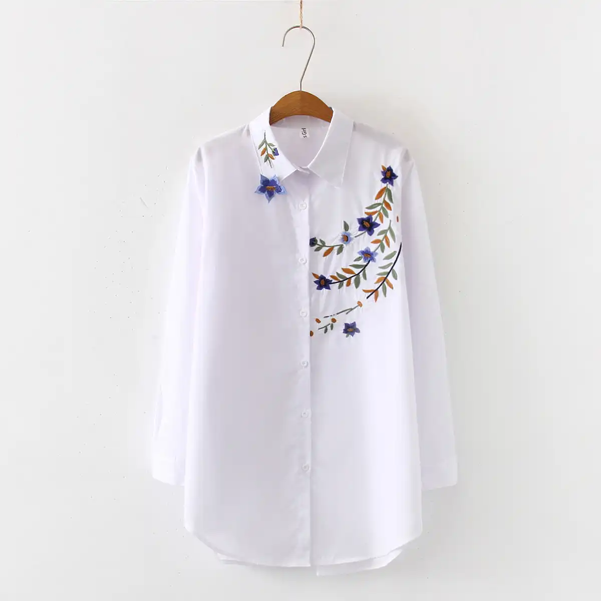 camisa blanca bordada mujer