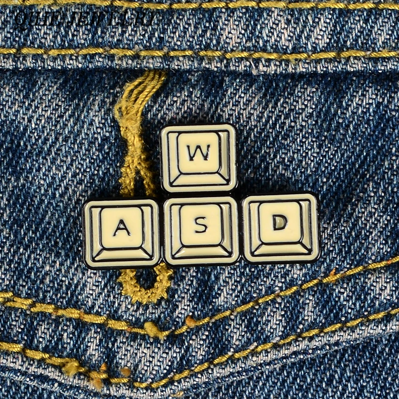 

QIHE JEWELRY Gold WASD Keyboard Pins Computer Game Button Enamel pins Badges Brooches Denim jackets Blouse Gift For Game Lover