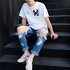 Trendy men's summer big hole leakage knee 9 / 9 jeans men's and women's lovers' Korean version thin beggar pants 5