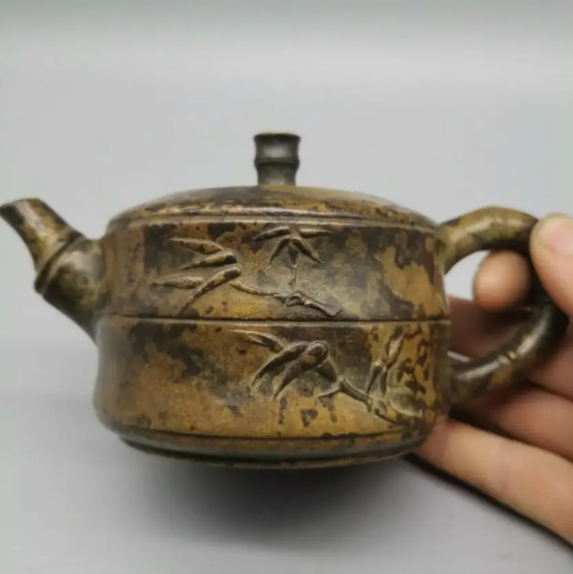 

Китайская статуя заварочного чайника из латуни и бамбука