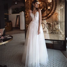 

Eightree Beach Wedding Dresses Spaghetti Straps V Neck Lace Appliques Bride Dress Backless Side Slit Bride Gown Vestido de noiva