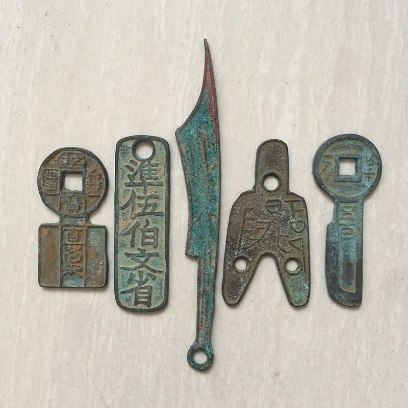 Three-hole coin, a set of five coins, a set of five parts 5