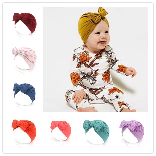 

Newborn Folded Bowknot Hat Baby Solid Color Knotted Pullover Hat Infant Soft Cotton Hats Beanies Knot Turban for Children New