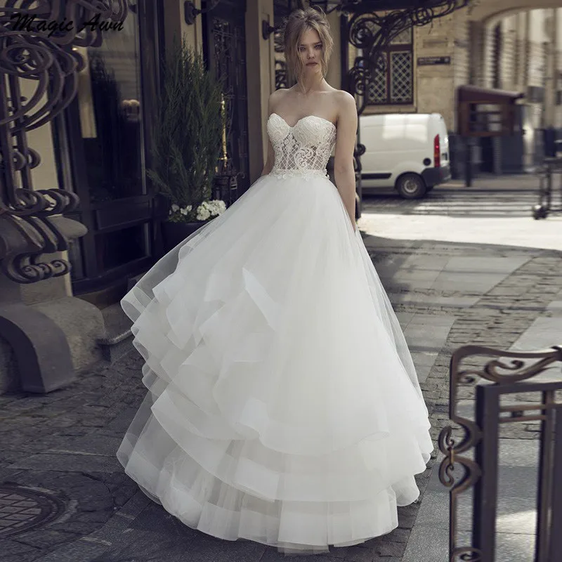 

Magic Awn Sweetheart Princess Wedding Dresses Lace Appliques Illusion Tiered Cake Bride Dress A-Line Vestidos Branco 2021