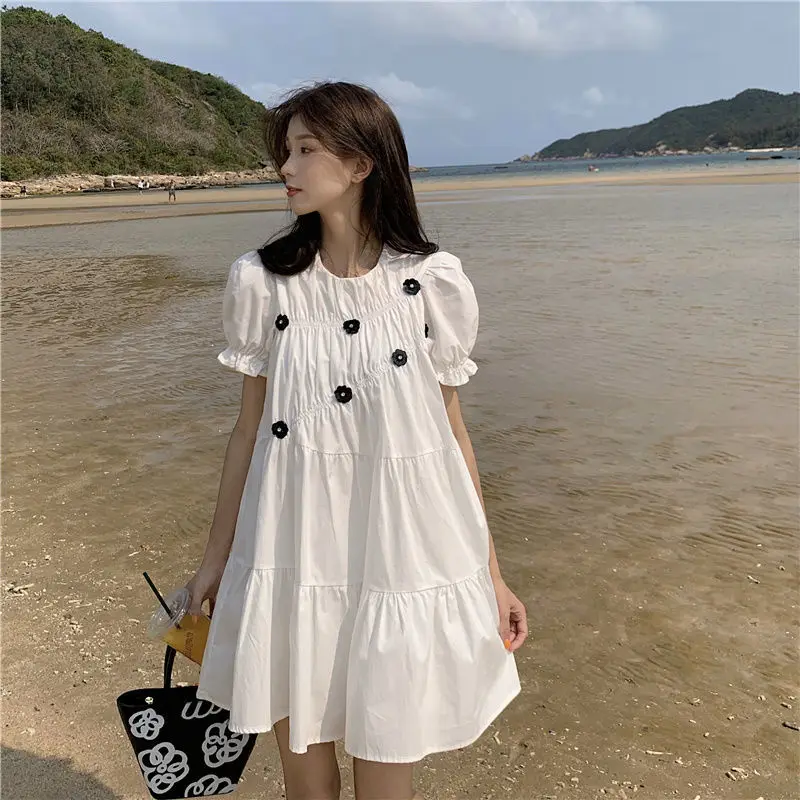 

Summer 2021 new Korean version sweet heavy industry bead piece flower bubble short sleeve dress female student loose skirt