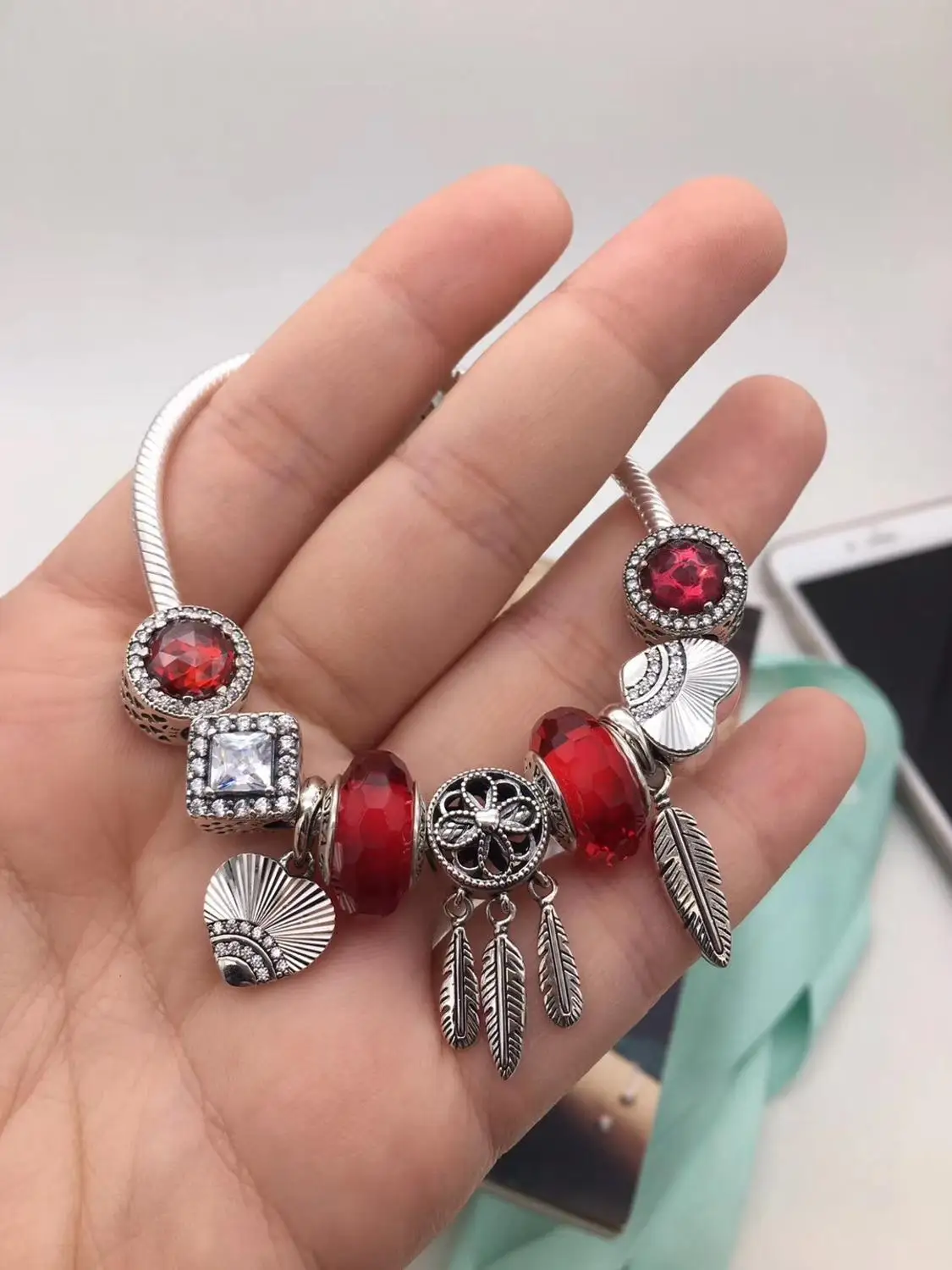 

Keris Store High Quality Original 1:1 100%925 Sterling Silver Charm Red Glaze Beads Cat Eye Bracelet Free Shipping