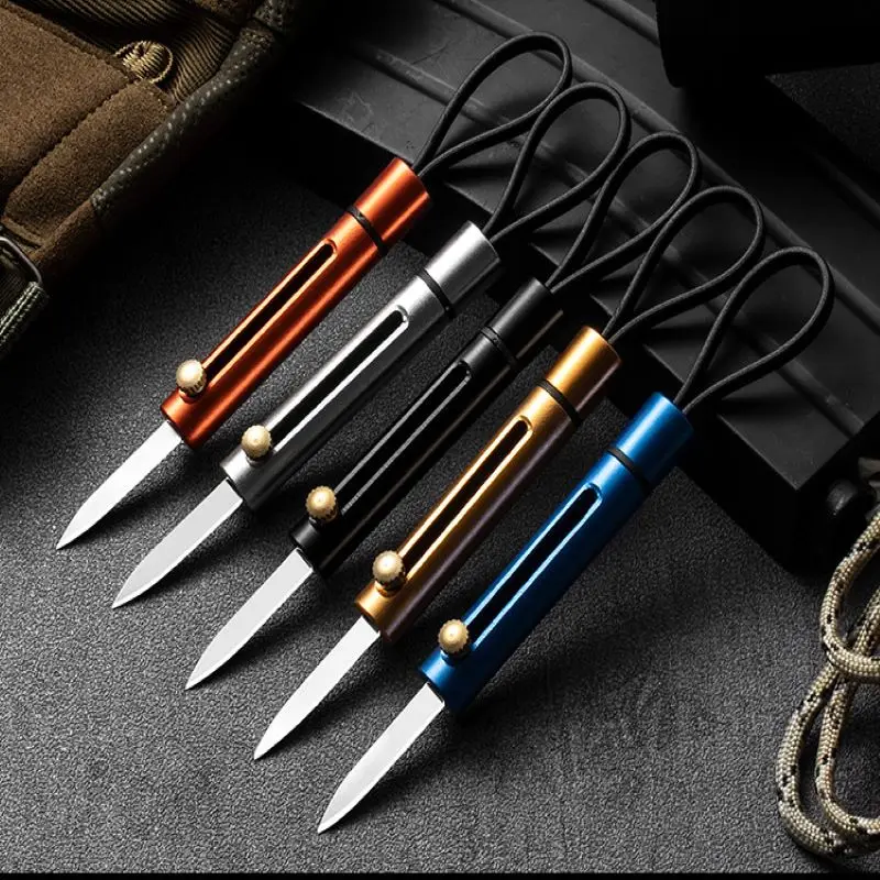 

Mini Portable Knife EDC Creative Push Knife Outdoor Tool Key Ring Fruit Knife