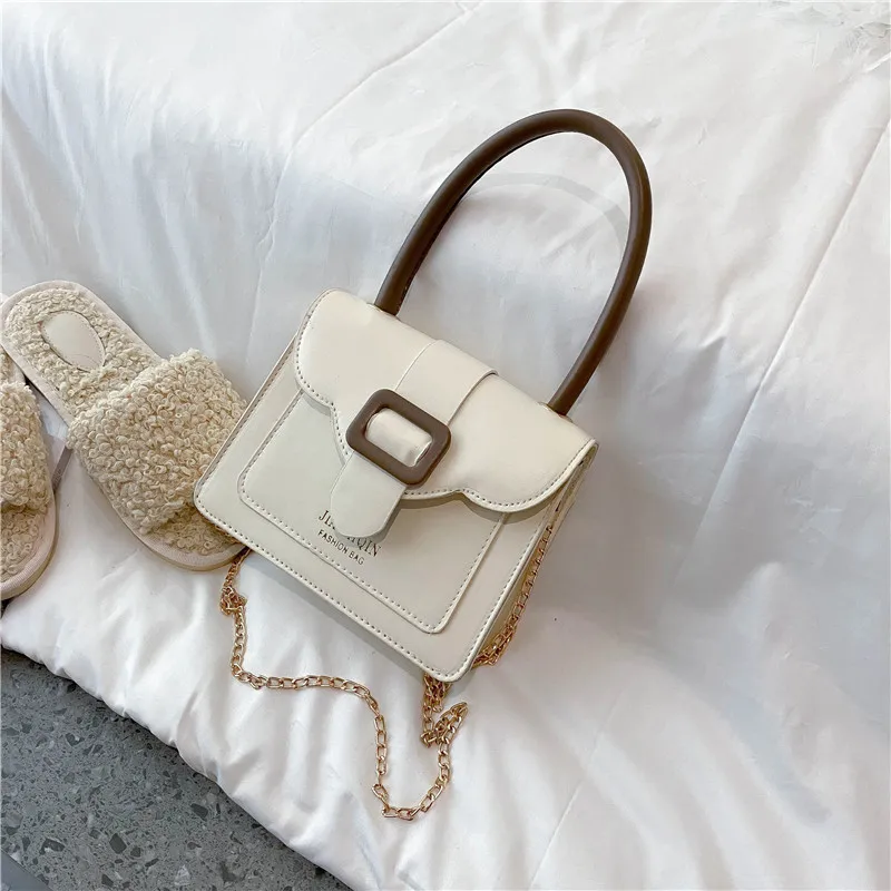 

Summer sweet retro commuter bag female simple wild small square bag foreign travel small satchel