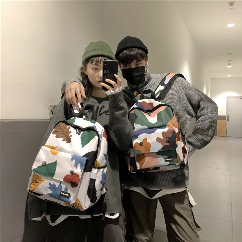 

2020 new spring style graffiti leaf geometric figure portable student school bag junior high school student backpack