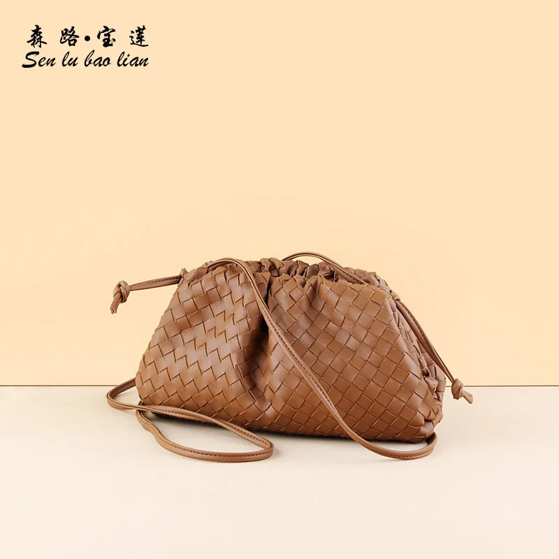 

Carry cloud bag solid color straw bag first layer woven dumpling bag leather crossbody bag