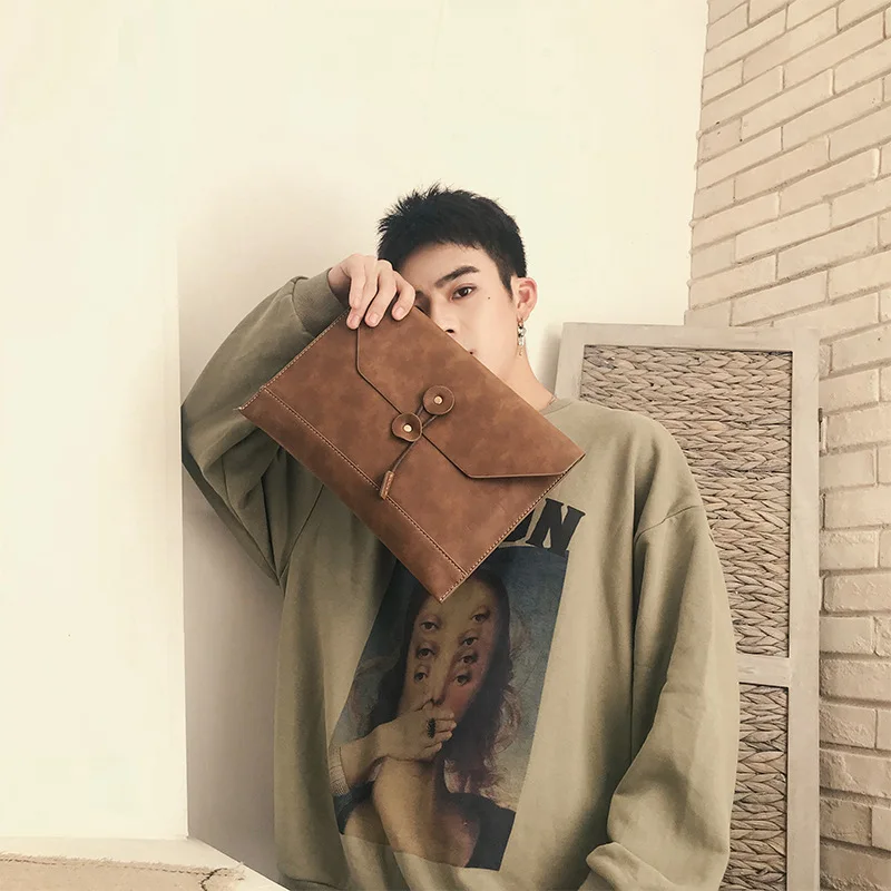 

Leisure leather youth bag handbag business file bag IPAD bag 100 retro men envelope bag hand bag