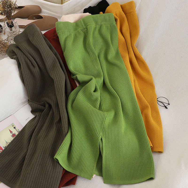 

Spring and autumn new Korean version of sweet college style solid color knitted skirt high waist back split A-line bag hip skirt