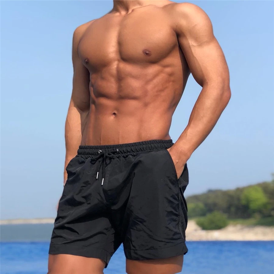 Men's fitness fitness beach shorts men's summer gyms exercise men and women breathable sportswear jogging beach shorts