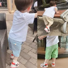 Новинка года; сезон лето; Детские эластичные шорты из хлопка в Корейском стиле; модные повседневные шорты для мальчиков и девочек