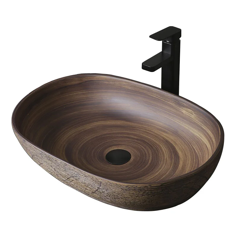 

Ceramic Art Basin Sinks Counter Top Wash Basin Vessel Sinks Oval Washing Basin Bathroom Sinks Ceramic Wash Basin with Faucets