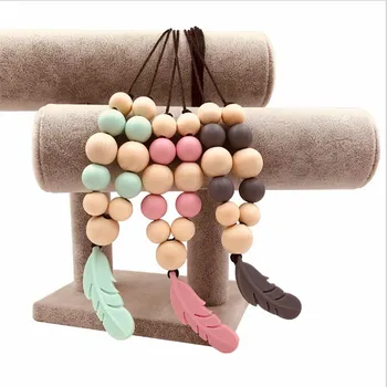 

Baby Teething Toys Silicone Training Baby Teethers Necklace Feather Pendant Necklace Chewing Toy Gifts Beads Pacifier Clip