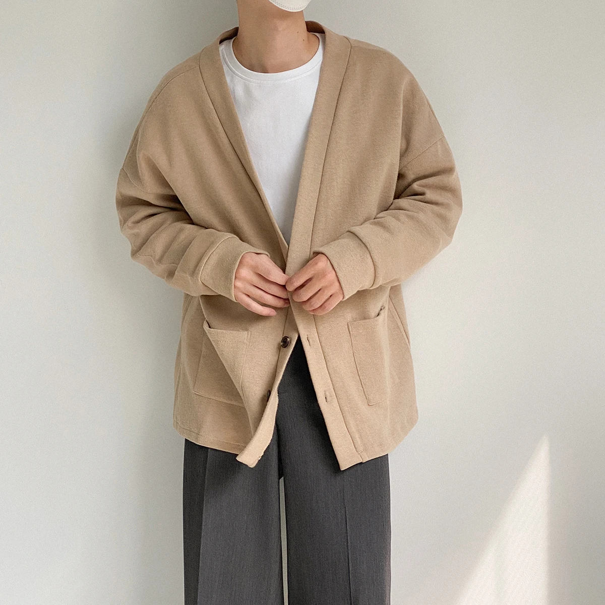 

Autumn cardigan sweater men's loose and versatile solid color knitted jacket Korean version of the trend of handsome texture