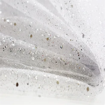 

White Twinkle mini silver dot tulle fabric sold by meter